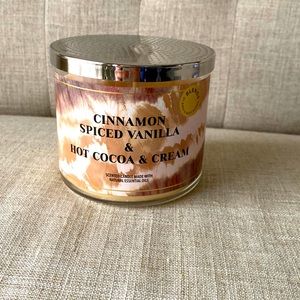 Bath and body works 3 wick candle. Cinnamon Spiced Vanilla & Cocoa and Cream